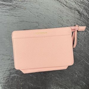 NWOT Coccinelle pink clutch